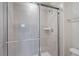 Clean shower with glass enclosure and tiled walls at 1274 Shoreside St, Clermont, FL 34714