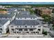 An aerial view of the townhouses and surrounding area at 12964 Brandon Coates Dr, Orlando, FL 32828