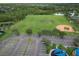 Aerial view of community park with sports fields and parking at 12964 Brandon Coates Dr, Orlando, FL 32828