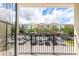 View from balcony showcases a parking lot and apartment complex at 12964 Brandon Coates Dr, Orlando, FL 32828