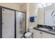 Clean bathroom with granite countertop and shower at 12964 Brandon Coates Dr, Orlando, FL 32828