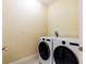 Laundry room with washer and dryer at 12964 Brandon Coates Dr, Orlando, FL 32828