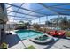 Refreshing pool and spa with screened enclosure at 13214 Meergate Cir, Orlando, FL 32837