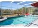 Inviting screened pool and spa with serene view at 13214 Meergate Cir, Orlando, FL 32837