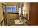 Bathroom with shower/tub combo and tile walls at 1425 N Hiawassee Rd, Orlando, FL 32818