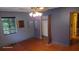 Bright bedroom with hardwood floors and neutral walls at 1425 N Hiawassee Rd, Orlando, FL 32818