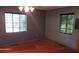 Bright bedroom with hardwood floors and neutral walls at 1425 N Hiawassee Rd, Orlando, FL 32818