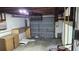 Garage with workbench and storage shelves at 1425 N Hiawassee Rd, Orlando, FL 32818