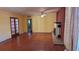 Living room with hardwood floors and fireplace at 1425 N Hiawassee Rd, Orlando, FL 32818