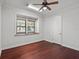 Bright bedroom with hardwood floors and a window seat at 1470 Place Picardy, Winter Park, FL 32789