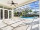 Relaxing pool area with screened enclosure at 1470 Place Picardy, Winter Park, FL 32789