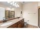 Double vanity bathroom with walk-in shower at 15319 Stonebriar Way, Orlando, FL 32826