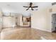 Bright Gathering room with tile floors and views to the kitchen at 15319 Stonebriar Way, Orlando, FL 32826