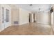 Open living area with tile floors and views into other rooms at 15319 Stonebriar Way, Orlando, FL 32826