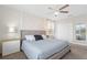 Main bedroom with king-size bed and access to private balcony at 1551 Flange Dr, Davenport, FL 33896