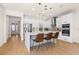 Modern kitchen with white cabinets, a large island, and stainless steel appliances at 15944 Citrus Knoll Dr, Winter Garden, FL 34787