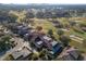 Aerial view of house and surrounding golf course at 1812 Turnberry Ter, Orlando, FL 32804