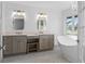 Spa-like bathroom with double vanity and free-standing tub at 1812 Turnberry Ter, Orlando, FL 32804