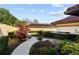 Landscaped garden path with lush tropical plants at 1812 Turnberry Ter, Orlando, FL 32804