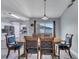 Dining room with view of kitchen with stainless steel appliances at 1834 Roper Rd, St Cloud, FL 34771