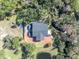 House with large backyard, pond, and brick patio at 2323 Tuskawilla Rd, Oviedo, FL 32765