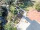 Brick patio and walkway bordering a pond at 2323 Tuskawilla Rd, Oviedo, FL 32765