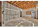 Unfinished basement room with exposed brick and plumbing at 2323 Tuskawilla Rd, Oviedo, FL 32765