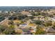 Aerial view of neighborhood featuring tree-lined streets and single Gathering homes at 24414 Woodhill Ct, Sorrento, FL 32776