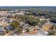 Aerial view showing home's location in a peaceful residential community at 24414 Woodhill Ct, Sorrento, FL 32776