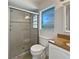 Bathroom with shower, toilet and granite countertop at 270 Debary Dr, Debary, FL 32713