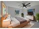 Modern bedroom with light wood furniture and ceiling fan at 270 Debary Dr, Debary, FL 32713