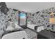 ' bedroom with Dalmatian-themed walls and twin beds at 2720 Bushman Dr, Kissimmee, FL 34746