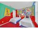 ' bedroom with a Mickey Mouse theme and twin beds at 2720 Bushman Dr, Kissimmee, FL 34746