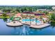 Aerial view of resort-style pool and clubhouse at 2720 Bushman Dr, Kissimmee, FL 34746