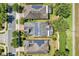 Three homes with solar panels, top-down view at 305 Silver Maple Rd, Groveland, FL 34736