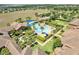 Aerial view of resort-style pool and spa at 305 Silver Maple Rd, Groveland, FL 34736
