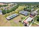 Aerial view of community tennis courts at 305 Silver Maple Rd, Groveland, FL 34736