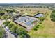 Aerial view of community tennis courts at 305 Silver Maple Rd, Groveland, FL 34736