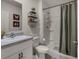 Clean bathroom with shower/tub combo and updated vanity at 325 Pelham Park Dr, Deland, FL 32720