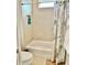 Small bathroom with tub and shower combination at 5114 Jareds Landing Way, Oxford, FL 34484