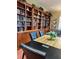 Quiet library with large book collection and table at 5114 Jareds Landing Way, Oxford, FL 34484