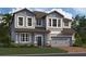 Two-story house with gray siding, brown trim, and a two-car garage at 5232 Prairie Preserve Run, St Cloud, FL 34772