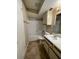 Clean bathroom with a bathtub, toilet, and vanity at 5545 Devonbriar Way # 205, Orlando, FL 32822