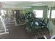 Well-equipped fitness center with various machines at 5545 Devonbriar Way # 205, Orlando, FL 32822