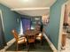 Dining room with a round table and four chairs at 5690 Sw 202Nd Ct, Dunnellon, FL 34431