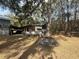 Mobile home and detached barn on a wooded lot at 5690 Sw 202Nd Ct, Dunnellon, FL 34431