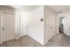 Upstairs hallway showing doors to the bedrooms at 581 Sun Warbler Way, St Cloud, FL 34771