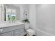 Clean bathroom with a bathtub, toilet and vanity at 6029 Wildline Dr, St Cloud, FL 34771