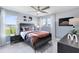 Bedroom with a football-themed comforter and window seating at 6029 Wildline Dr, St Cloud, FL 34771