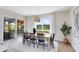 Light and airy dining room with sliding glass doors leading to backyard at 6029 Wildline Dr, St Cloud, FL 34771